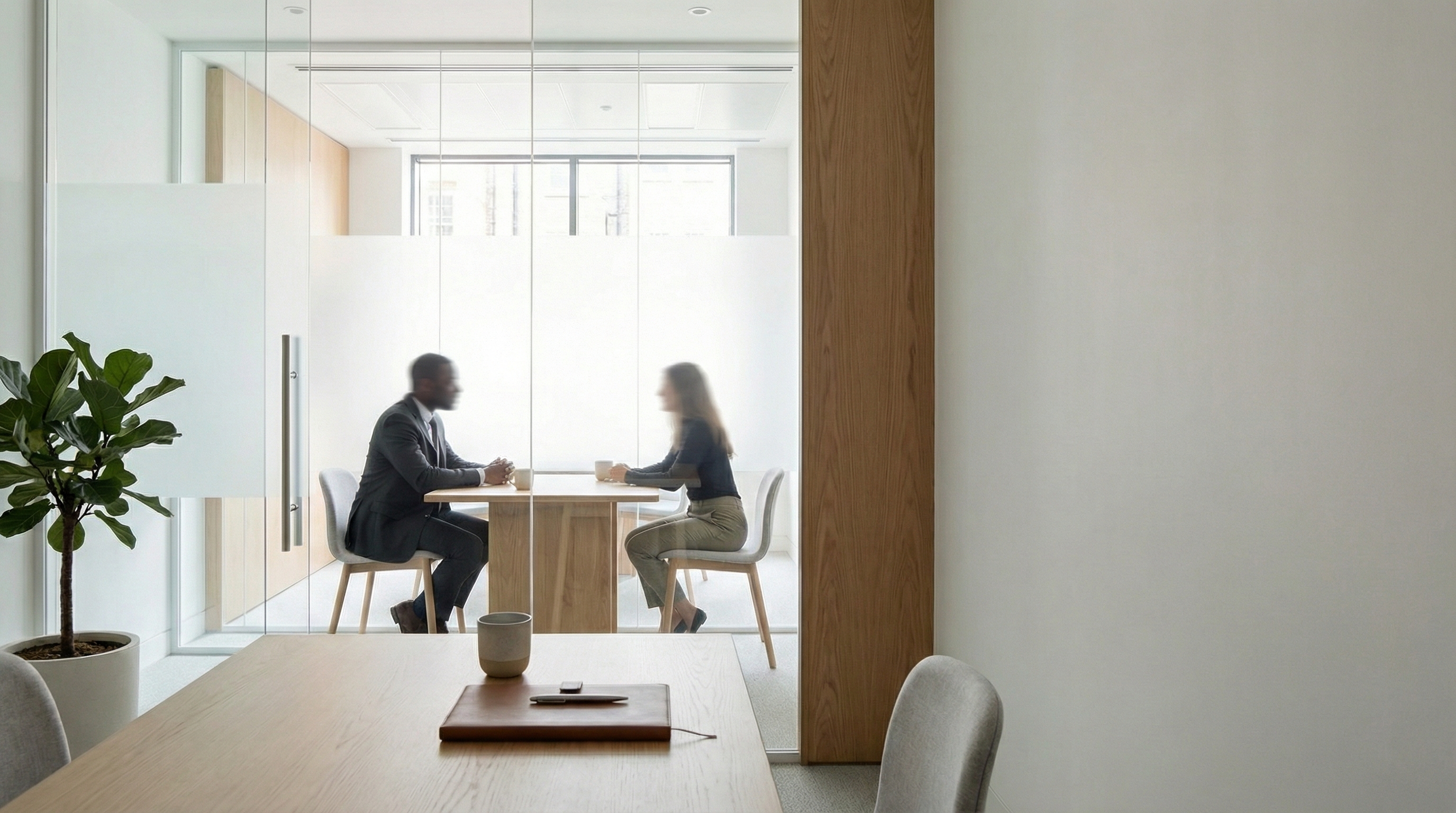 Consultation meeting inside a modern law office.